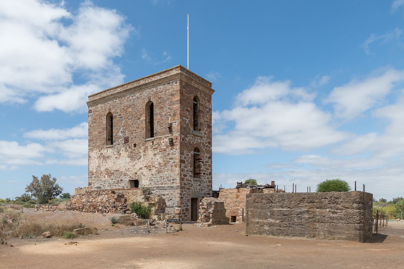 Cornish-built stone engine house ruin at Moonta Mines under a bright South Australian sky
